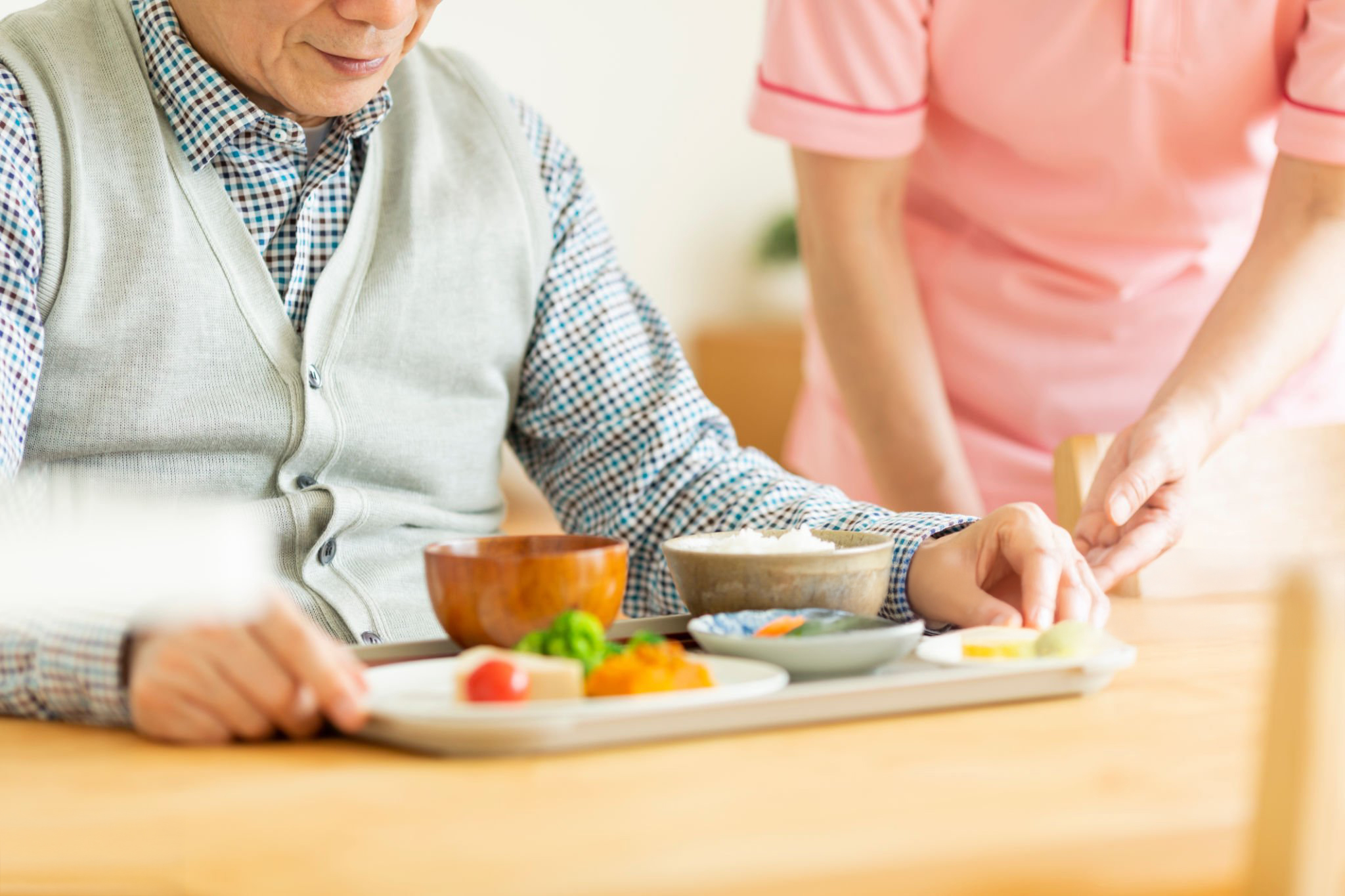 Meal assistance in a residential setting; shared stock placeholder